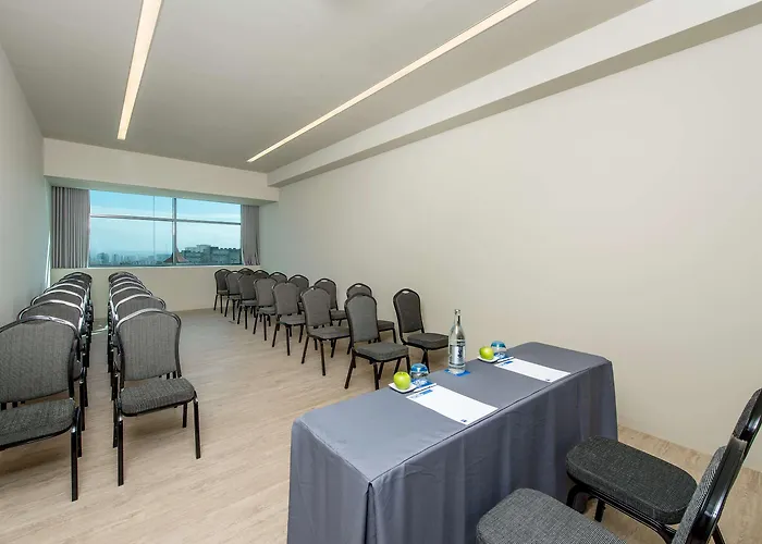 Melia Aeroporto Готель